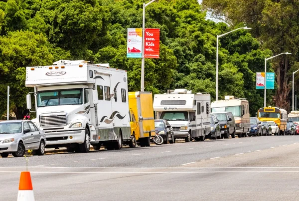 Campers and RVs parked on the side of El Camino Real