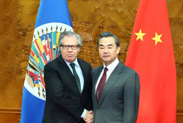 Chinese Foreign Minister Wang Yi, right, meets with Luis Almagro, secretary-general of the OAS