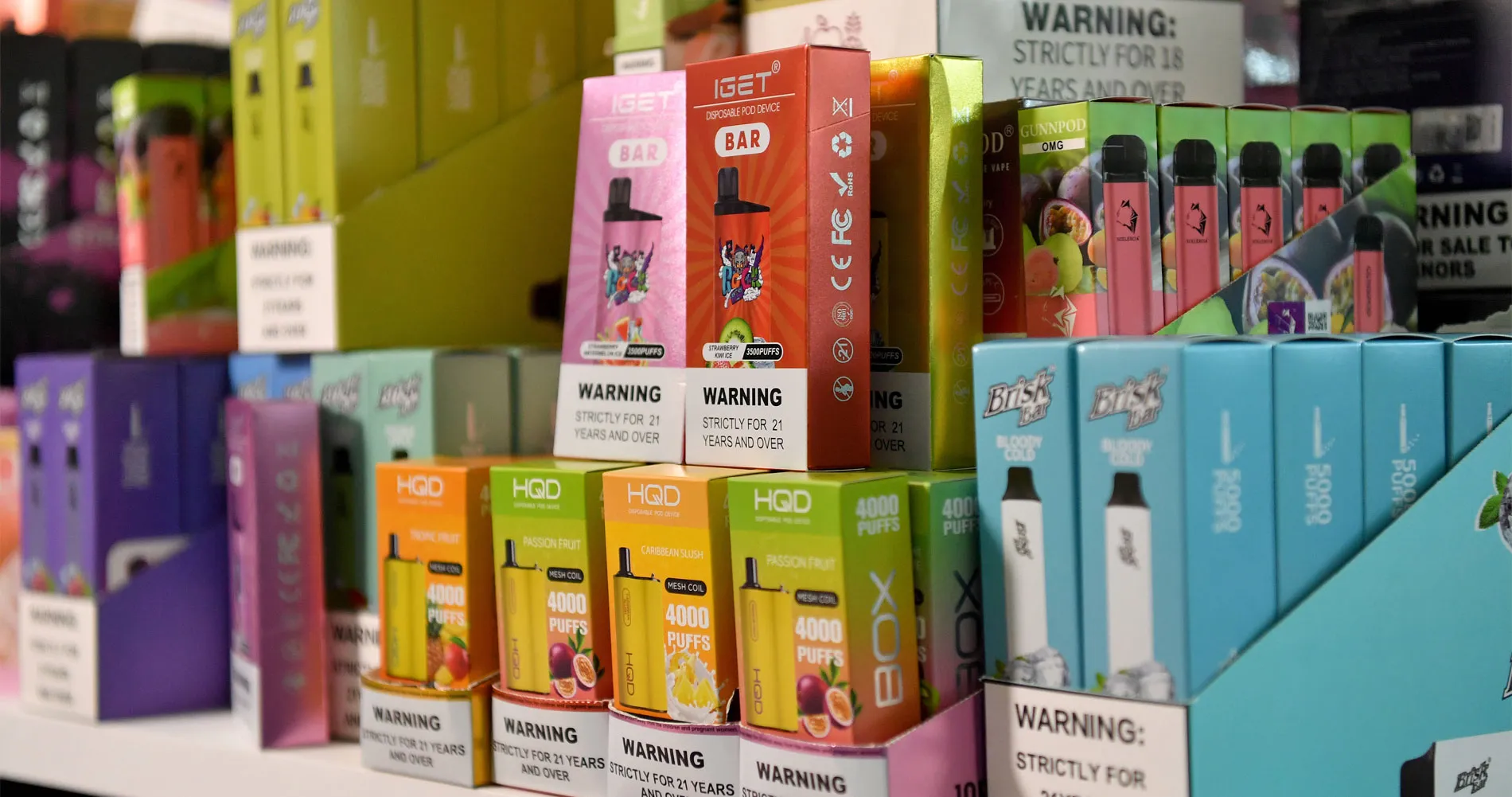 Illegal vapes are displayed during a press conference