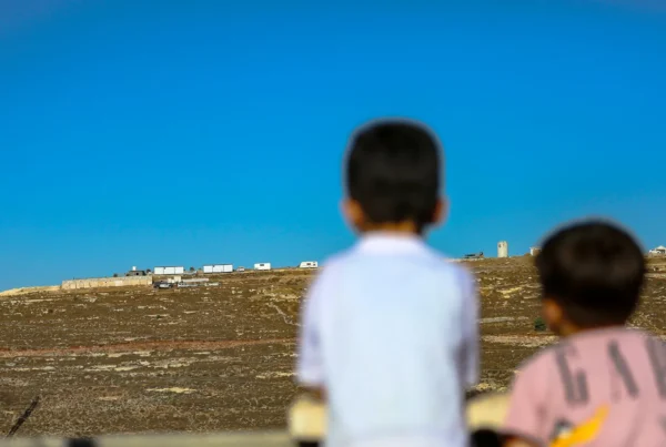 New Outpost on Jabal al-Jumuja Hilltop in Hebron Two Palestinian children stand on a rooftop