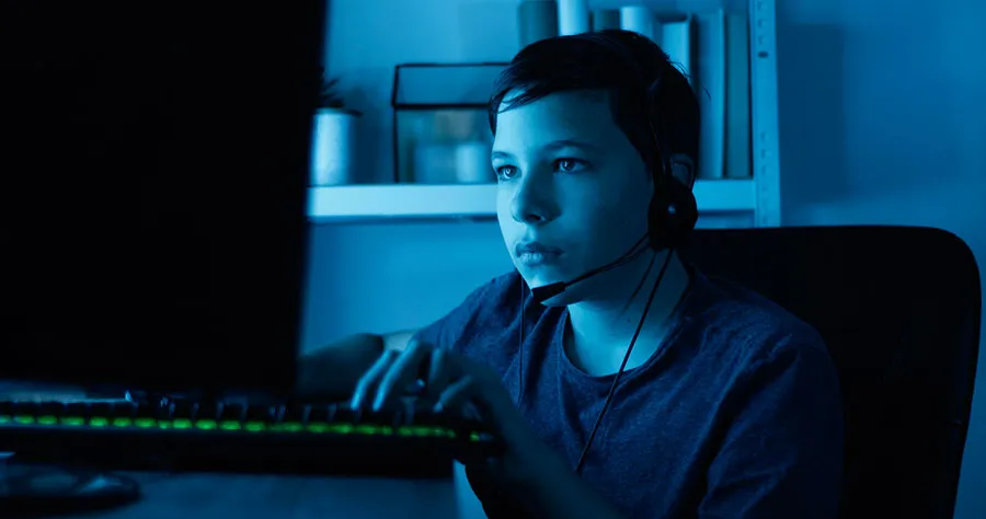 AI - boy in front of a computer