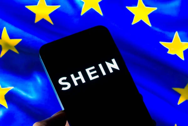SHEIN logo displayed on a mobile phone