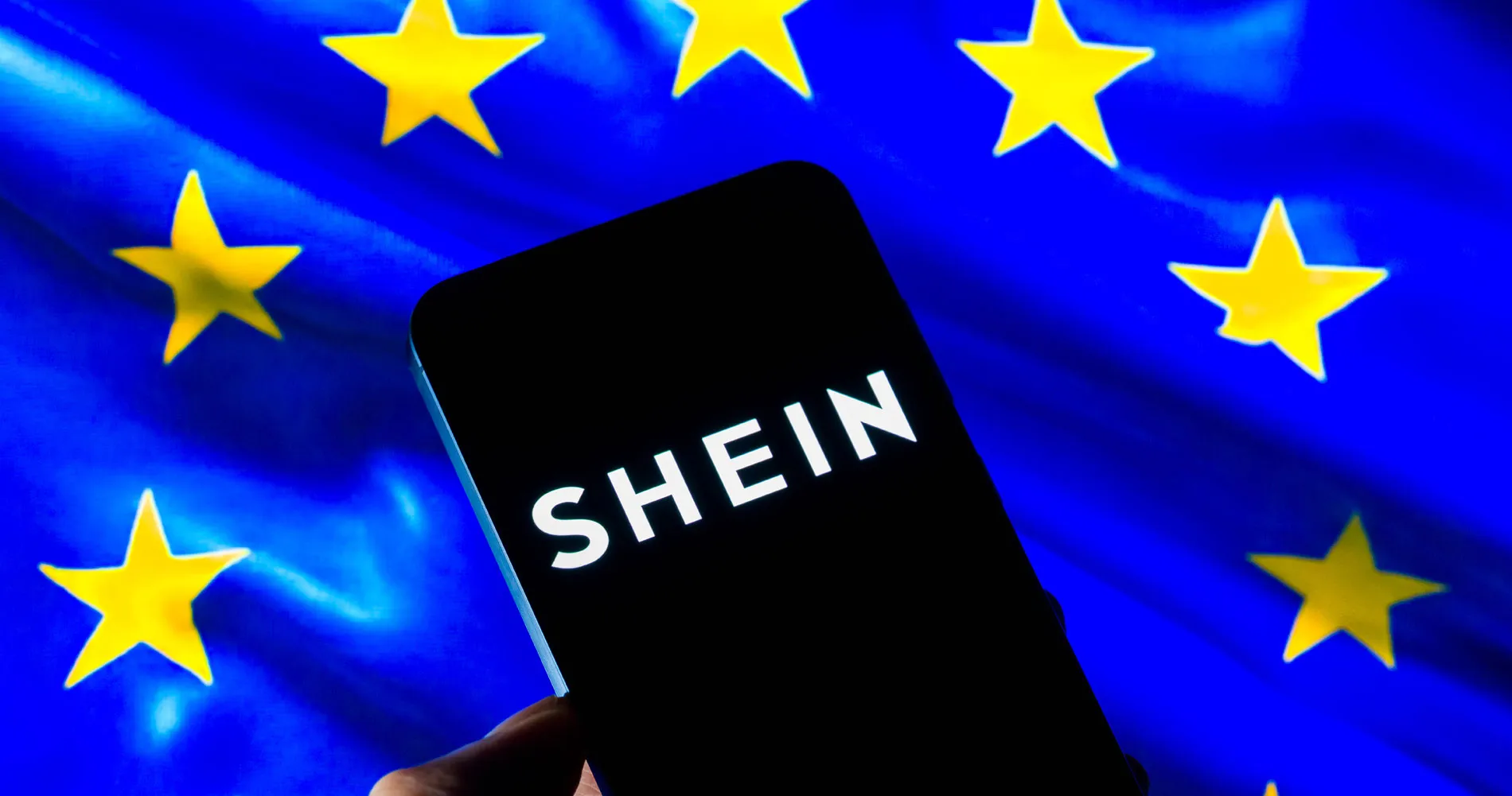 SHEIN logo displayed on a mobile phone