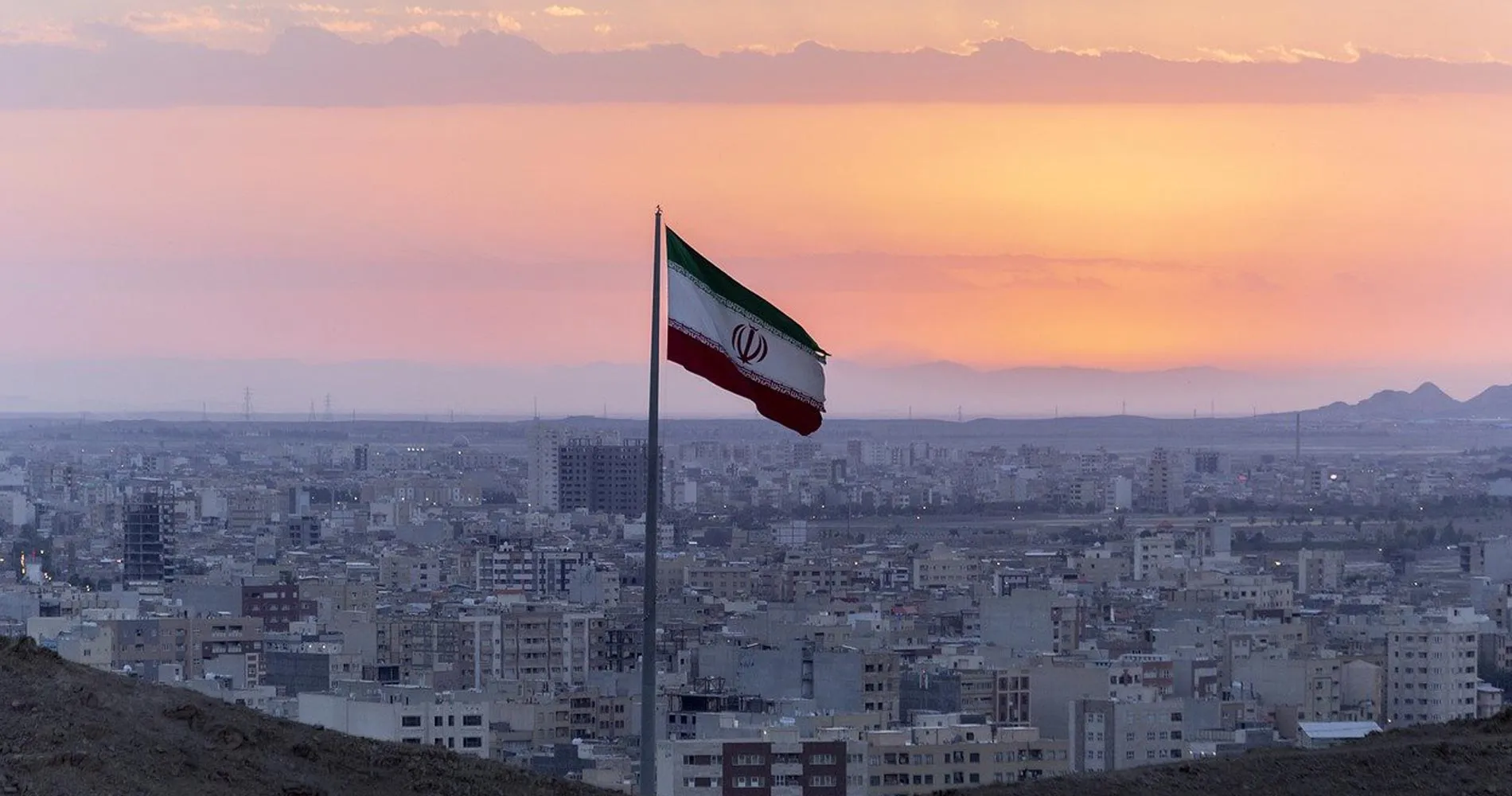 Iran: landscape with flag